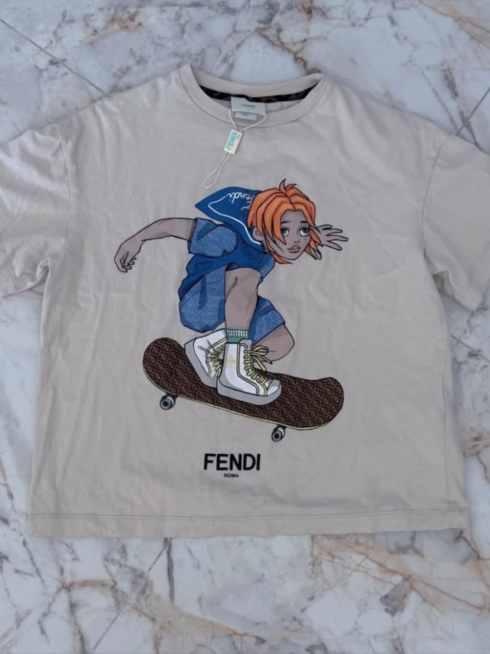 Fendi Kids Beige Tee with Blue & Orange Skateboard Graphic